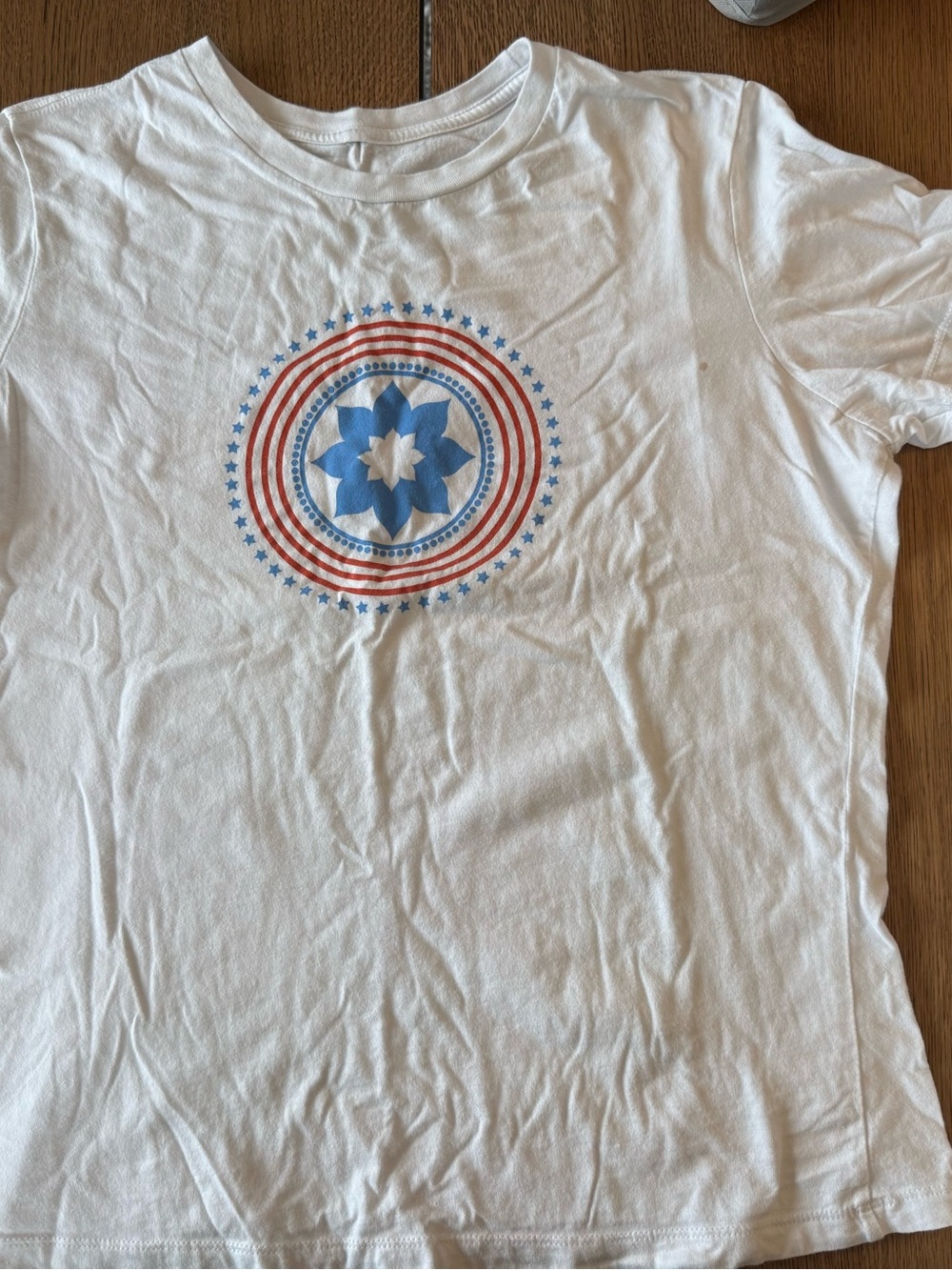 White Short-Sleeve Graphic Tee with Blue Star Emblem
